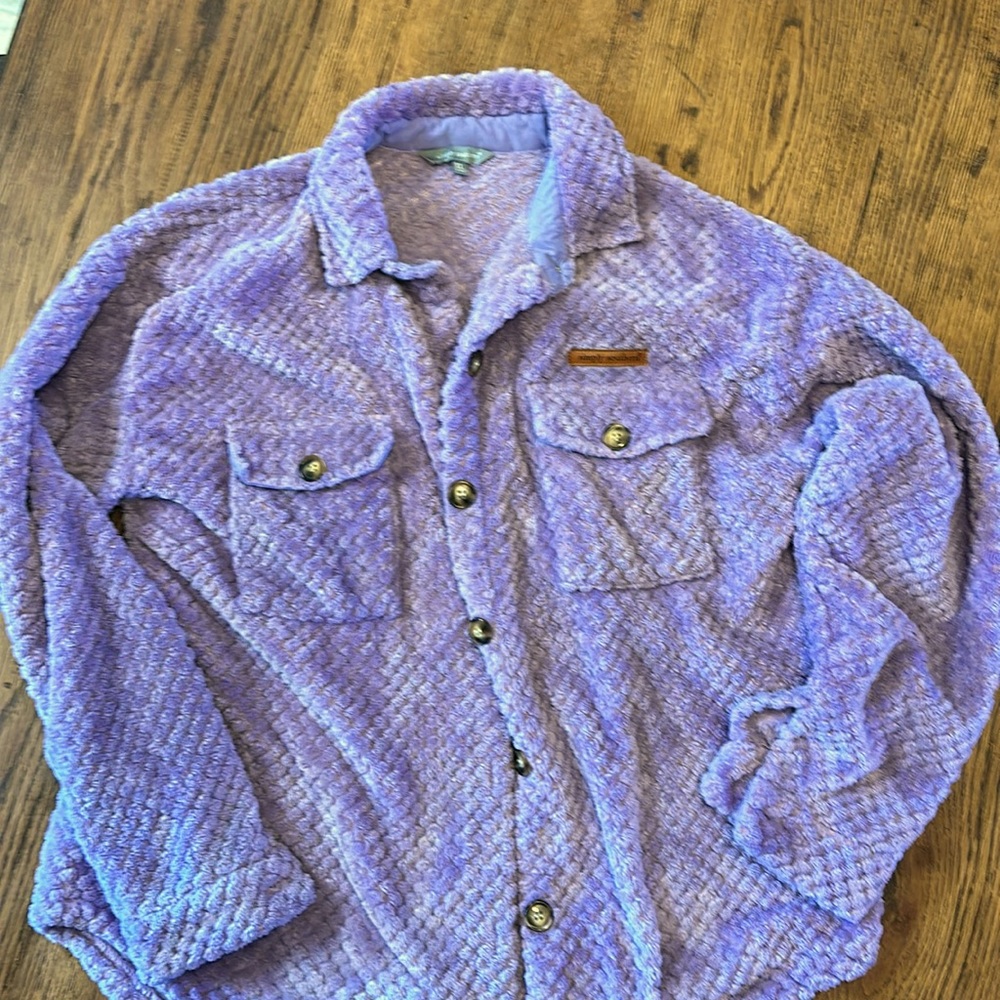 Woman’s light purple Sherpa button up